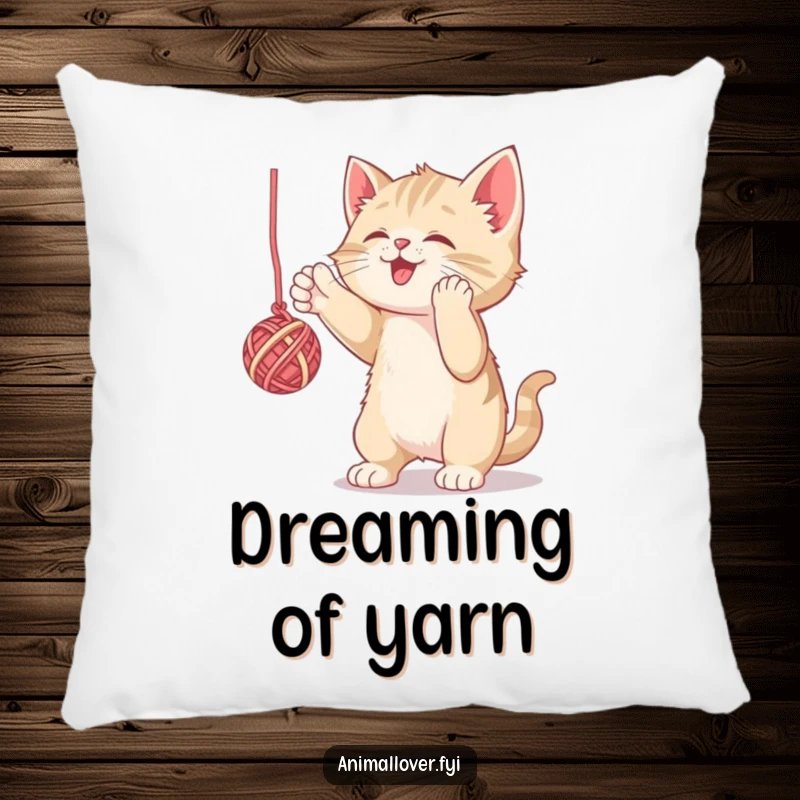 Funny pillow featuring a playful kitten batting at yarn, offering comfort and a humorous touch. A delightful decorative item.