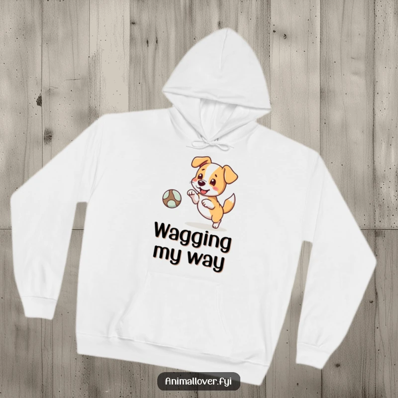 Funny hoodie featuring a happy dog character excitedly fetching a ball, tail wagging with pure canine happiness. Cozy pup.