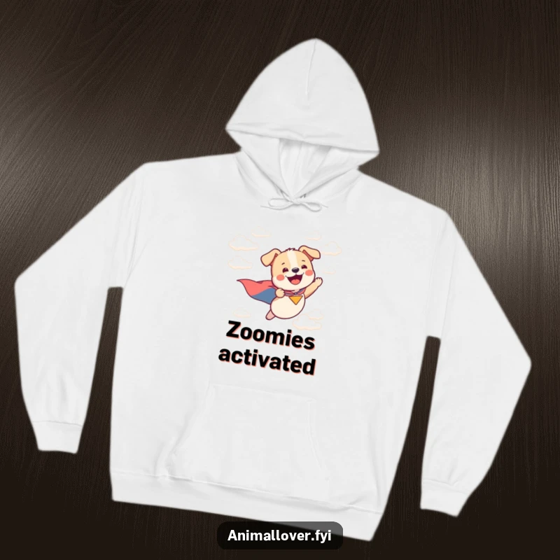 Funny hoodie with a happy, caped dog soaring through the clouds, offering warmth and a heroic vibe.