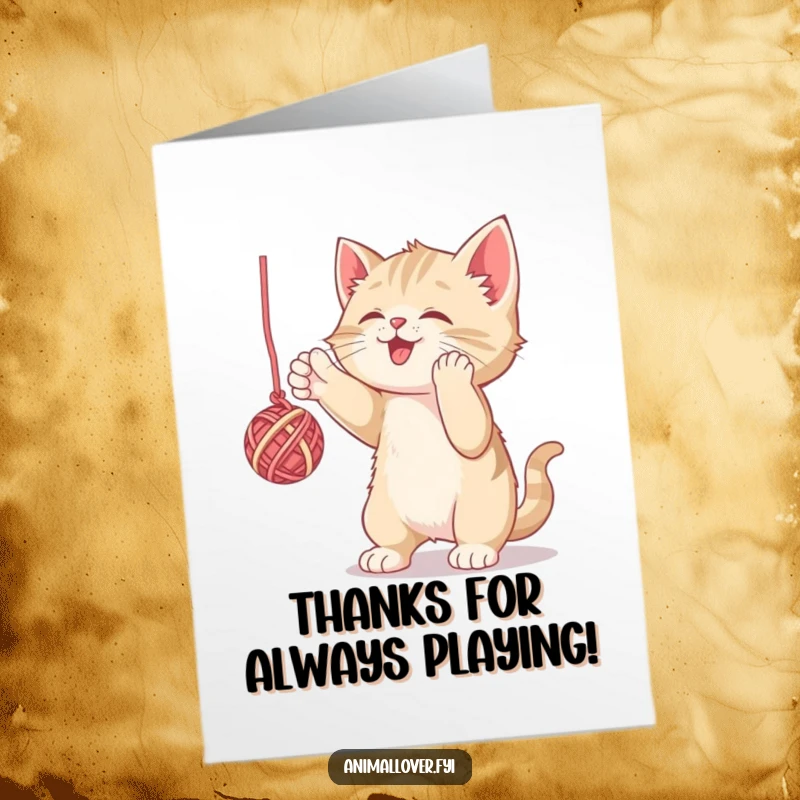 Funny Free Printable Thank You Card: A playful kitten batting at a ball of yarn, showing adorable gratitude, downloadable art.